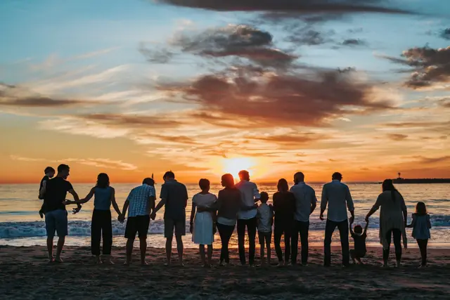 A family sharing a joyful moment together outdoors
